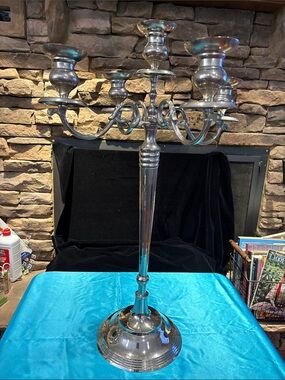 30.75-inch nickel-plated aluminum candelabra.